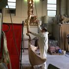 in the Foundry - Abyss Explorer -  a contemporary artwork in bronze being assembled 